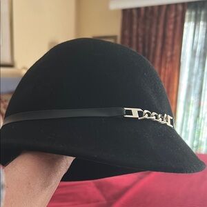Elegant Black Hat with Chain Detail. Classic cloche